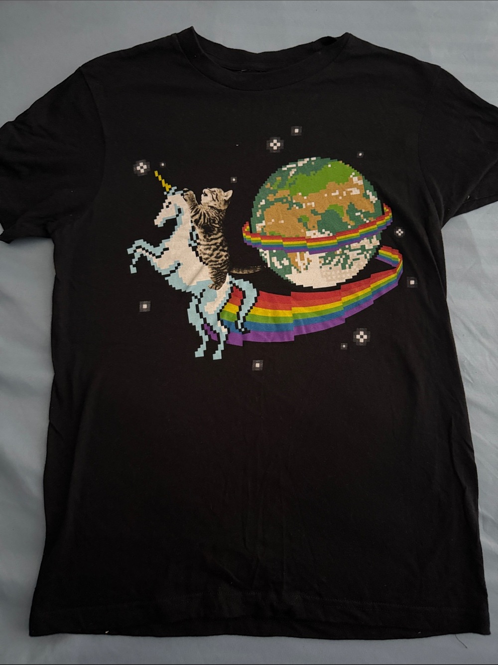 Black Matter Black Tee with Pixel Cat on Unicorn and Rainbow Planet